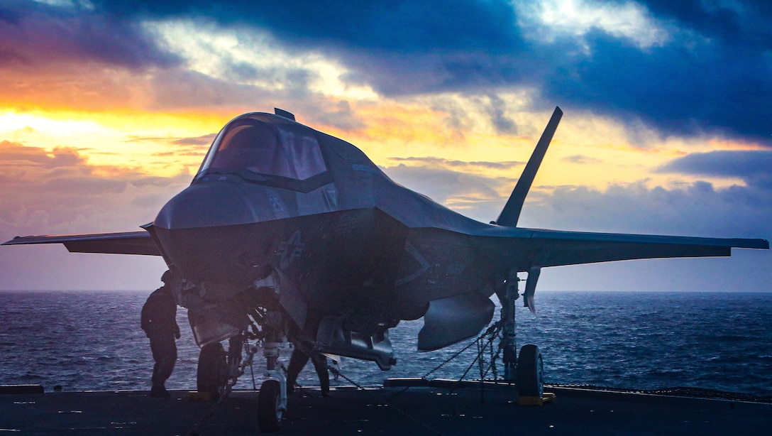 U.S. Marines conduct a safe for flight check on an F-35B Lightning II Joint Strike Fighter aboard HMS Queen Elizabeth at sea, Oct. 6.