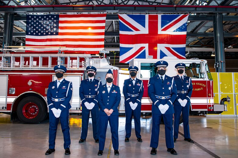 Airmen from the 423rd Air Base Group Honor Guard pose for a photo at RAF Alconbury, England, Sep. 30, 2020. The Honor Guard is responsible for rendering honors at official ceremonies throughout the Wing. (U.S. Air Force photo by Senior Airman Eugene Oliver)