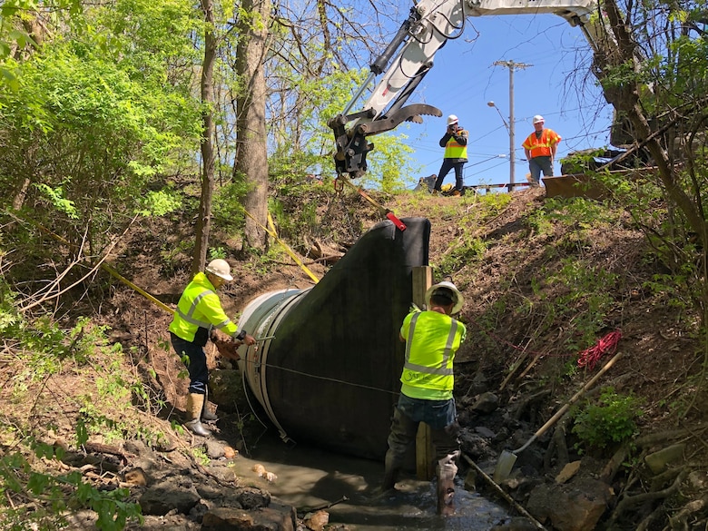 U.S. Army Corps of Engineers Buffalo District contractors install a check valve at Wolf Creek in Barberton, OH, May 13, 2020.

This was performed as part of the Ohio-Erie Canal Aquatic Nuisance Species project in Akron, Ohio. The project will prevent or reduce the probability of nuisance species like Asian Carp being able to move from the Tuscarawas River Watershed into the Cuyahoga River Watershed via the Ohio-Erie Canal.