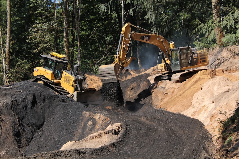 Contractors use heavy equipment to extinguish a coal fire at an abandoned Navy coal mine in Cumberland, Washington, August, 2020. At the request of the Office of Surface Mining and Reclamation, the USACE Omaha District's rapid response team was asked to provide assistance. (Courtesy photo by Mr. Jeremy Ayala)