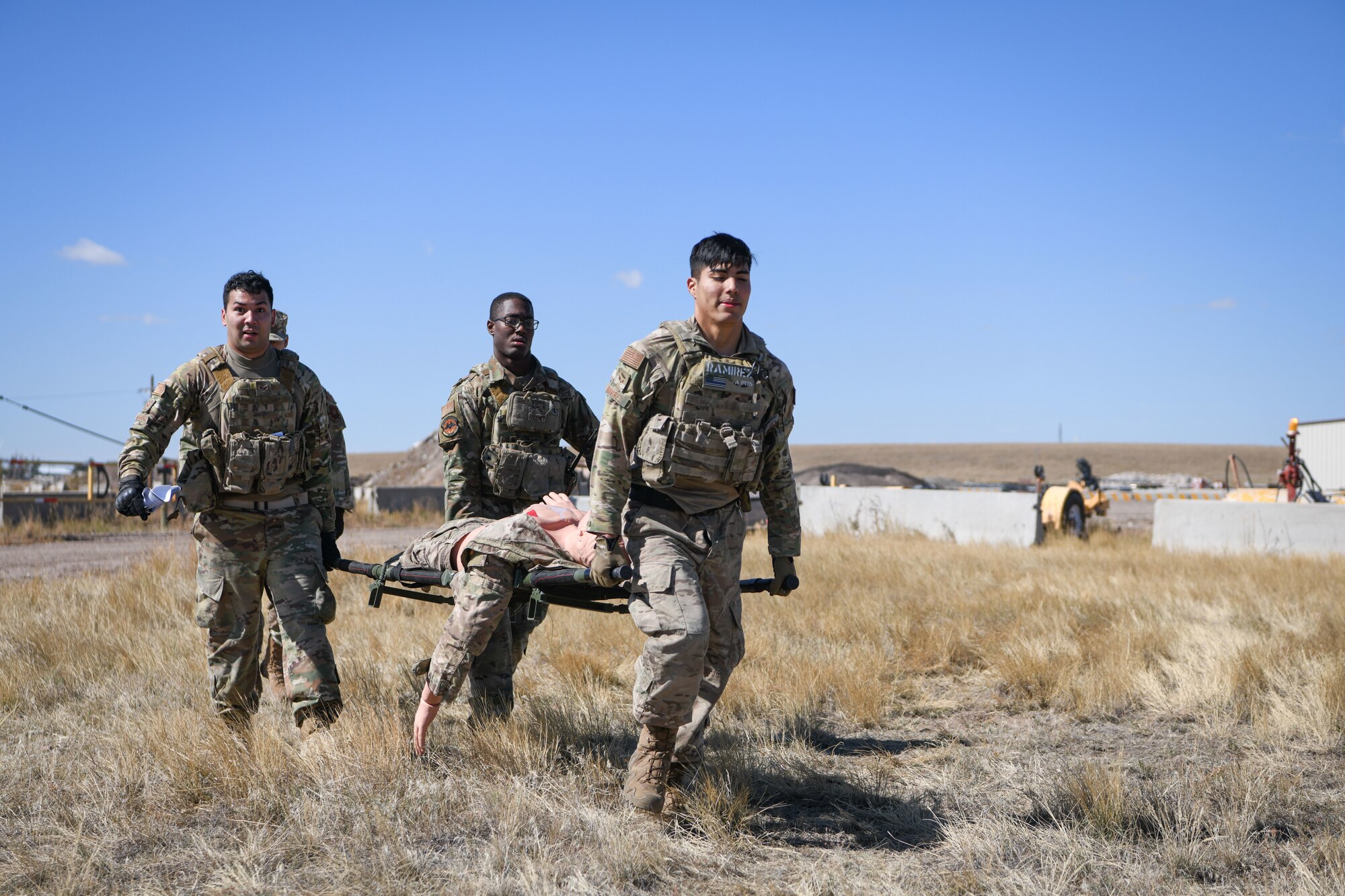 airmen carrying a litter