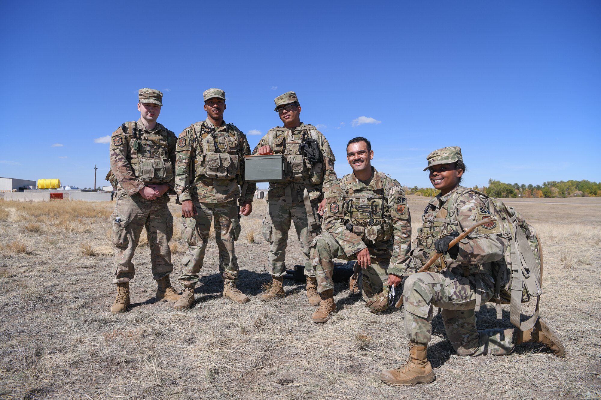 airmen take a break after completing an exercise