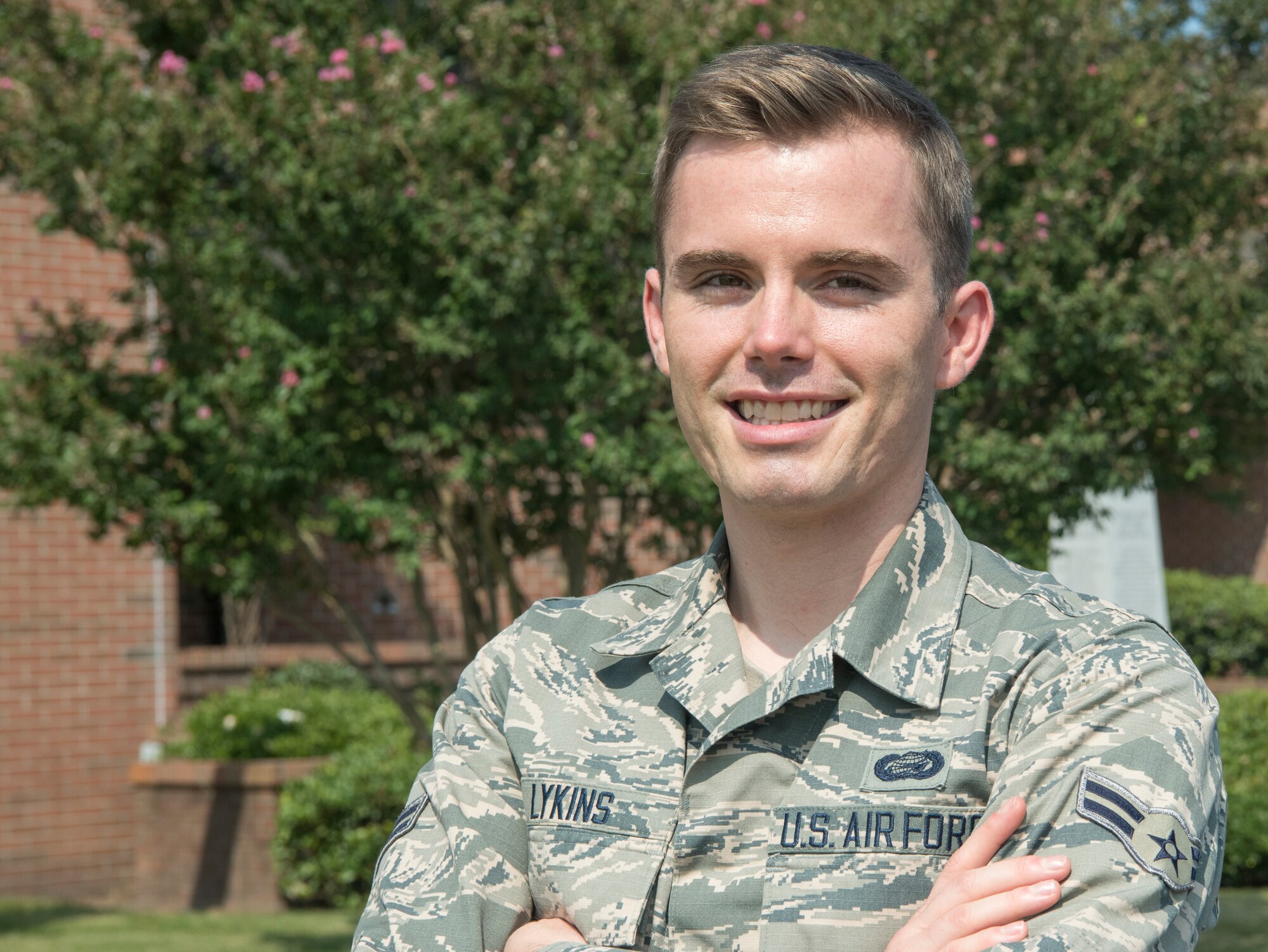An Airman smiles for a photo
