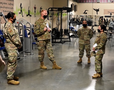Air Force Staff Sgt. Sean Mesina, Air Force Mortuary Affairs Operations religious affairs specialist, highlights AFMAO’s resiliency program resources to Army Brig. Gen. Hope Rampy, Adjutant General of the Army, during an orientation Oct. 6, 2020 at Dover Air Force Base, Delaware. The resiliency program is in place to support service members who have the sacred duty of caring for the fallen and their families. (U.S. Air Force photo by Staff Sgt. Benjamin N. Valmoja)