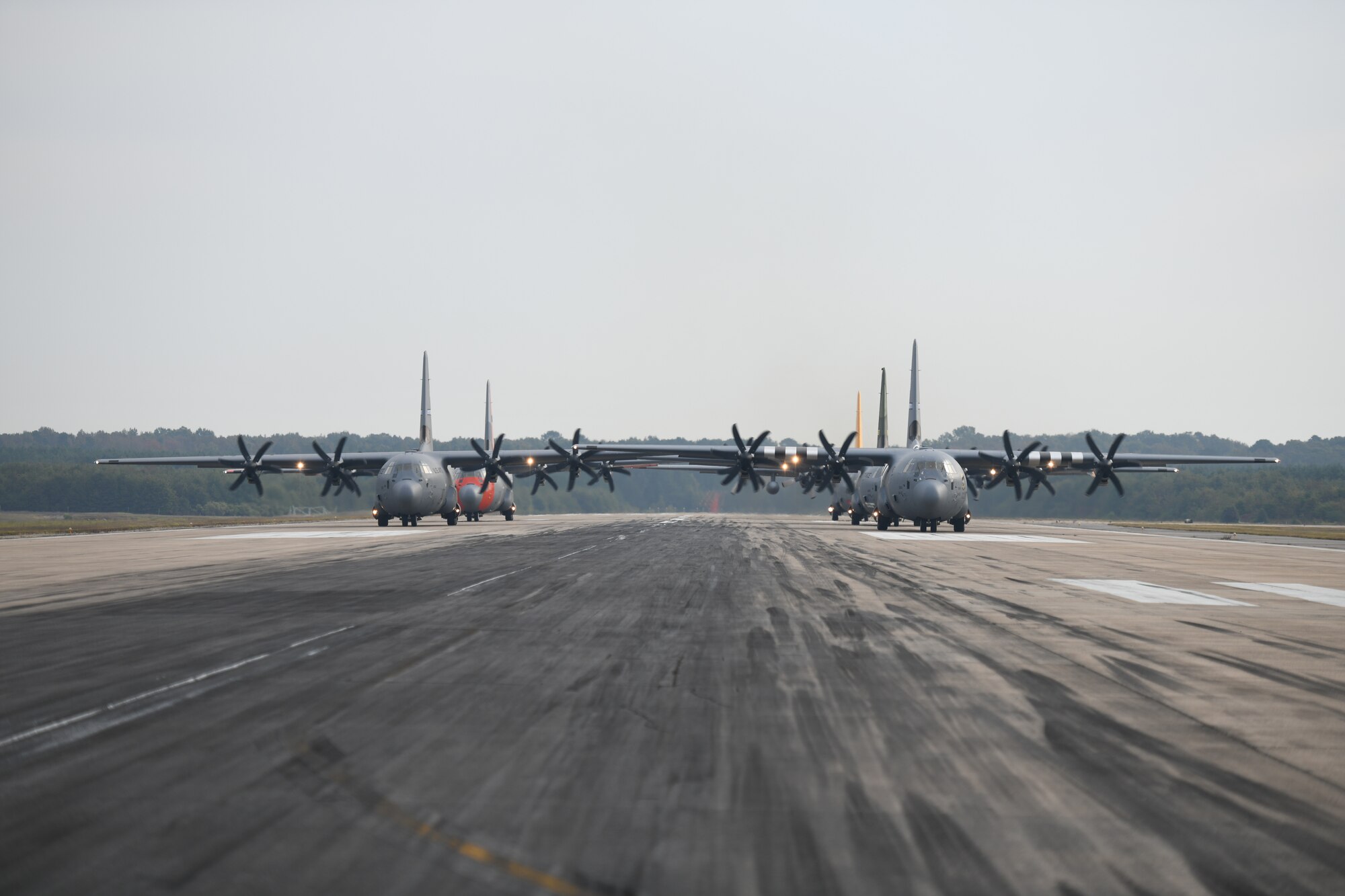 planes in runway with engines running