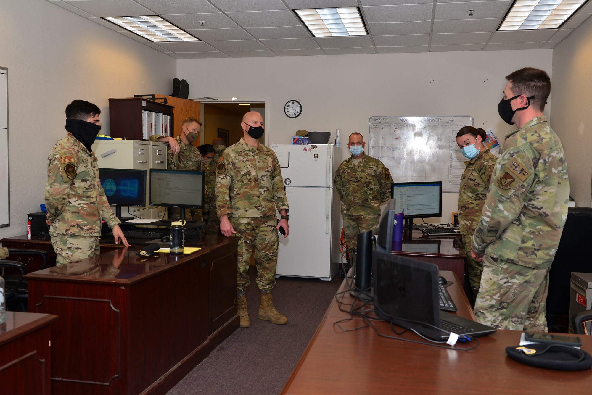 U.S. Air Force Col. David Berkland, the 354th Fighter Wing (FW) commander, and Chief Master Sgt. John Lokken, the 354th FW command chief, interact with the Airmen assigned to the 354th Security Forces Squadron (SFS) during a wing leadership immersion at Eielson Air Force Base, Alaska, Oct. 6, 2020.