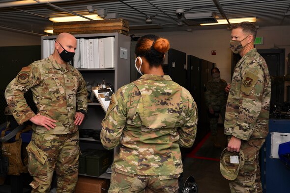 U.S. Air Force Senior Airman Chayna Chambers, a 354th Security Forces Squadron (SFS) installation entry controller, gives a tour of the armory to Col. David Berkland, the 354th Fighter Wing (FW) commander, and Chief Master Sgt. John Lokken, the 354th FW command chief, during a wing leadership immersion at Eielson Air Force Base, Alaska, Oct. 6, 2020.