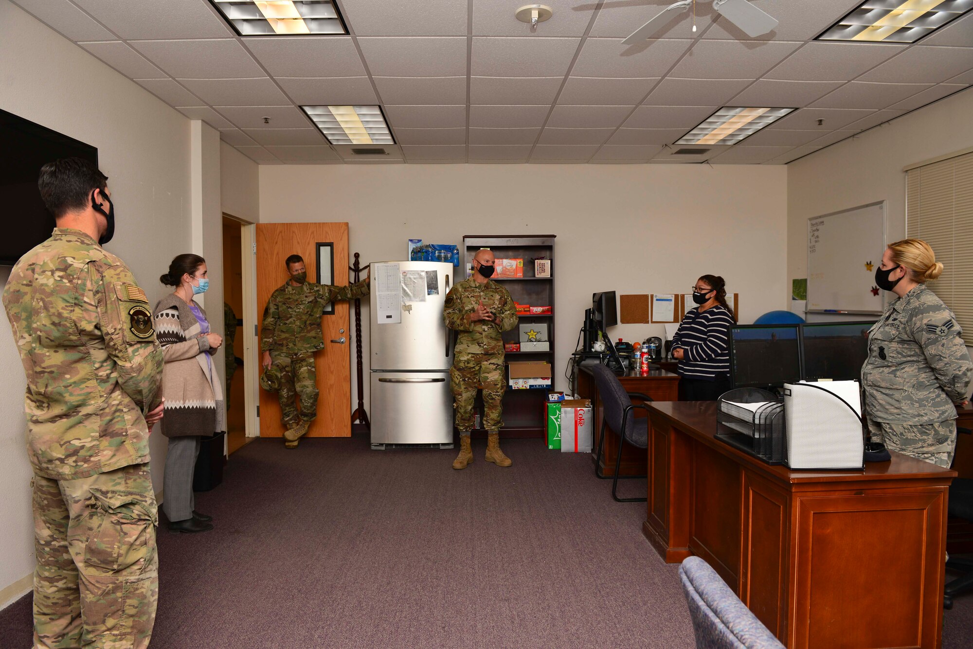 U.S. Air Force Col. David Berkland, the 354th Fighter Wing (FW) commander, and Chief Master Sgt. John Lokken, the 354th FW command chief, interact with the members of the 354th Security Forces Squadron (SFS) during a wing leadership immersion at Eielson Air Force Base, Alaska, Oct. 6, 2020.