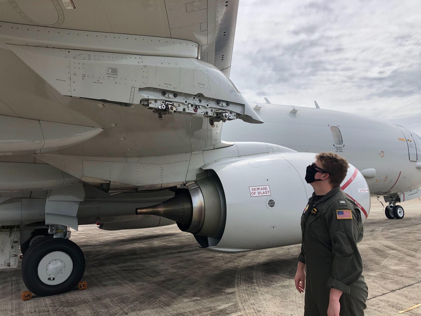 BRUNEI (Oct. 6, 2020) – Lt. j.g. Stephen Wierzbowski, from Patrol Squadron (VP) One inspects the wing on a P-8A Poseidon aircraft, prior to an operation in support of CARAT Brunei. CARAT is a ten-country exercise series between the United States and Bangladesh, Brunei, Indonesia, Malaysia, Singapore, Sri Lanka, the Philippines, Thailand, and Timor-Leste. (U.S. Navy Photo by Lt. Cmdr. Christopher Brass)