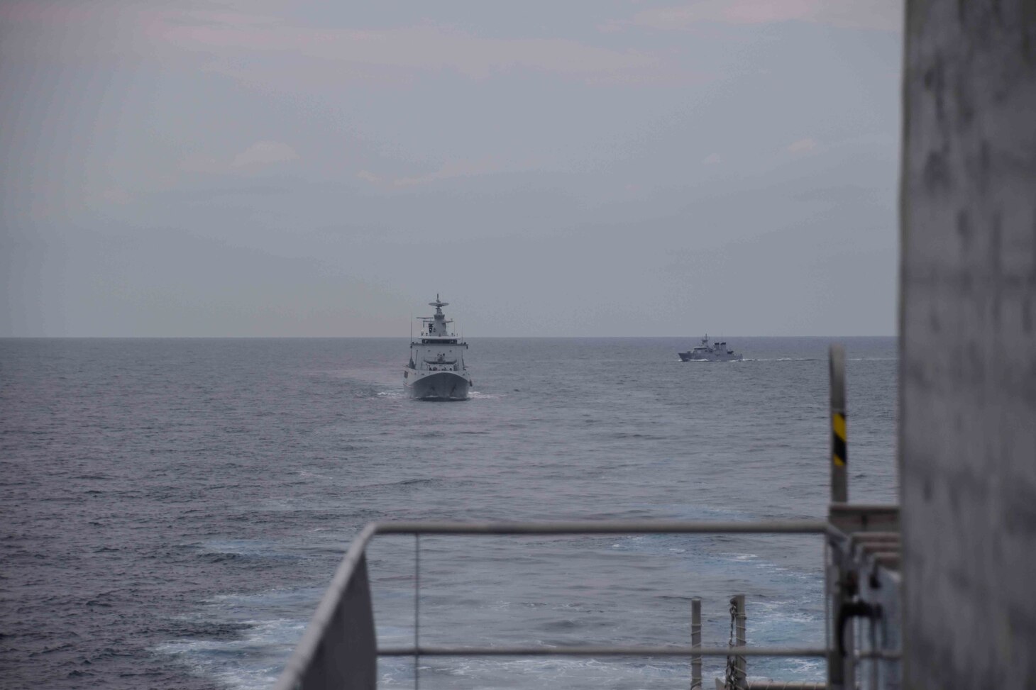 SOUTH CHINA SEA (Oct. 6, 2020) The Royal Brunei Navy offshore patrol vessel KDB Daruttaqwa (DTQ 09), inshore patrol vessel KDB Syafaat (SYA 19) and Spearhead-class expeditionary fast transport USNS Millinocket (T-EPF 3), transit in formation during a maneuvering exercise in support of Cooperation Afloat Readiness and Training (CARAT) Brunei. This year marks the 26th iteration of CARAT, a multinational exercise designed to enhance U.S. and partner navies' abilities to operate together in response to traditional and non-traditional maritime security challenges in the Indo-Pacific region. (U.S. Navy photo by Lt. Alexander Laabs)
