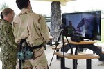 SANTA RITA, Guam (Oct. 6, 2020) Explosive Ordnance Disposal technicians assigned to the Task Group 75.1 EOD capability of Task Force 75 participate in a virtual subject matter expert exchange with troop commanders from the Royal Brunei Land Force (RBLF) during Cooperation Afloat Readiness and Training (CARAT) Brunei 2020. This year marks the 26th iteration of CARAT, a multinational exercise designed to enhance U.S. and partner navies' abilities to operate together in response to traditional and non-traditional maritime security challenges in the Indo-Pacific region. (U.S. Navy photo by Chief Mass Communication Specialist Travis Simmons)