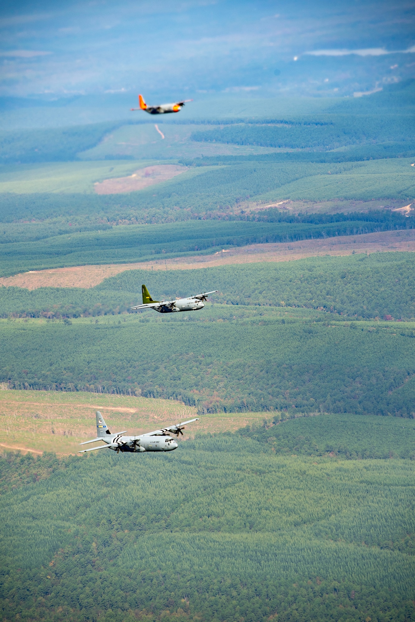 Planes flying over fields