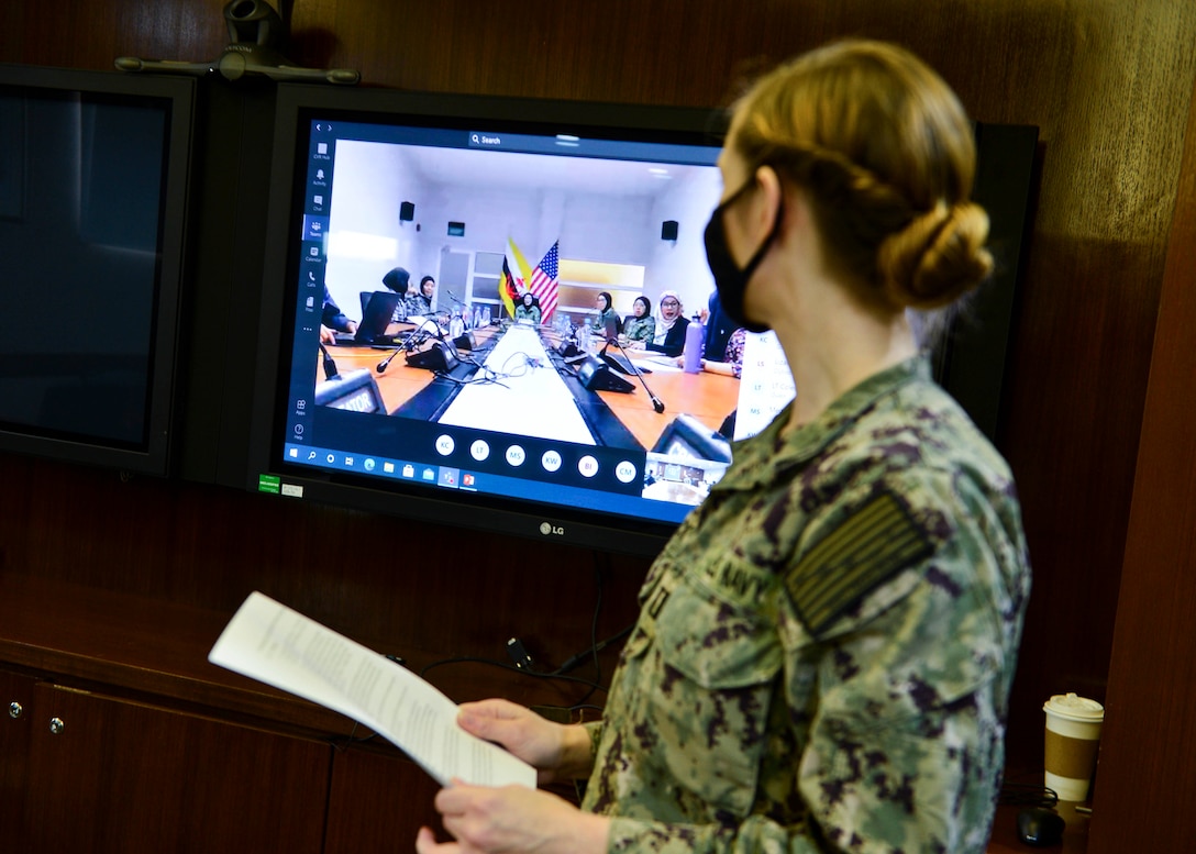 Lt. Clare Fitzpatrick, judge advocate general assigned to Singapore Area Coordinator, makes opening remarks during a virtual Women, Peace and Security subject matter expert exchange as part of Cooperation Afloat Readiness and Training (CARAT) Brunei 2020.