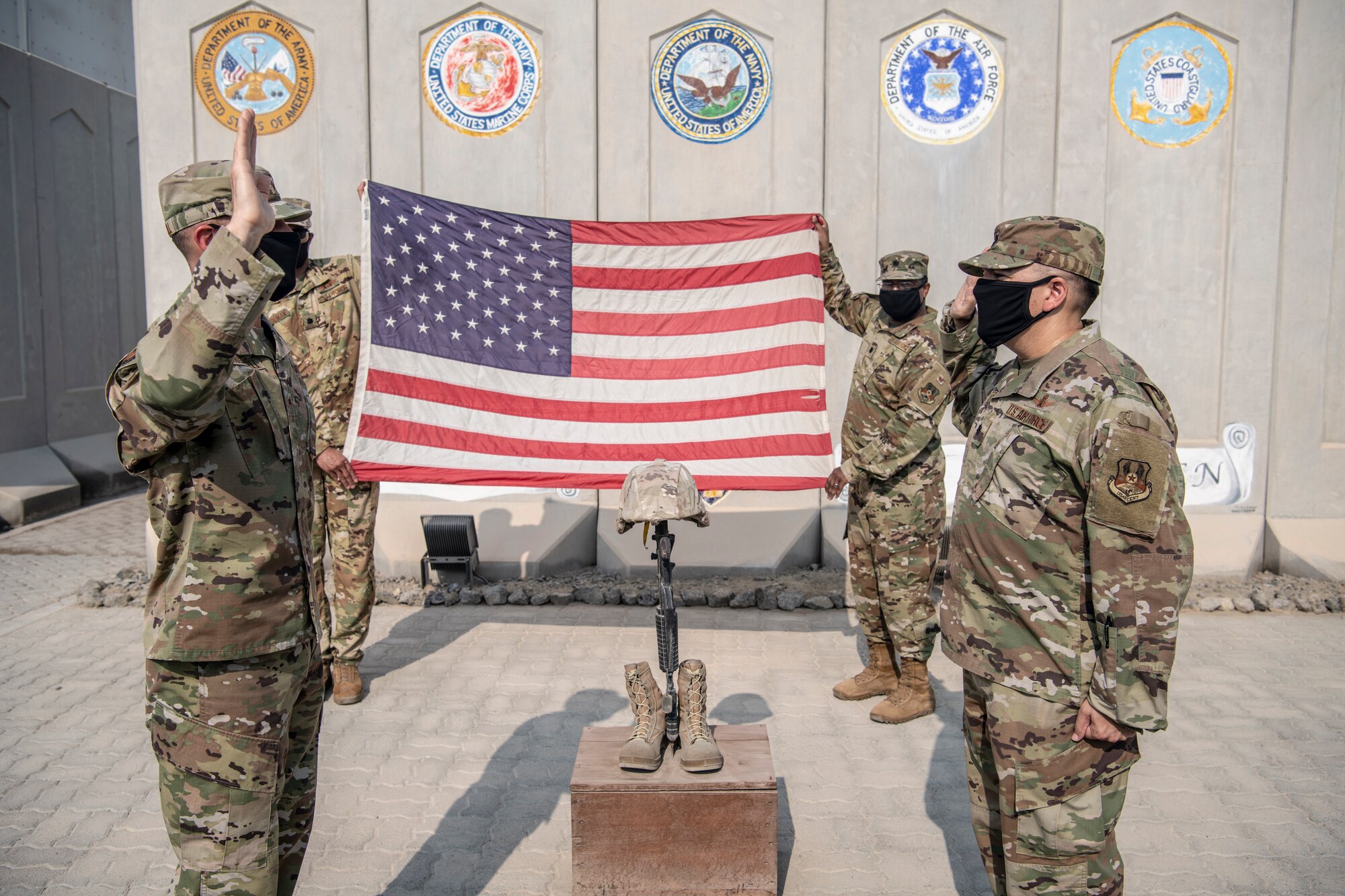 Brig. Gen. Larry Broadwell, 380th Air Expeditionary Wing commander, administers the oath of office to Lt. Col. William Hassey, 380th AEW director of staff, transferring into the U.S. Space Force during a ceremony at Al Dhafra Air Base, United Arab Emirates, Oct. 9, 2020.