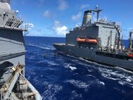 USS Antietam (CG 54) and the USS Tippecanoe (AO 21) perform a replenishment at sea (RAS).