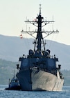 The guided missile destroyer USS Cole (DDG 67) arrives for a scheduled port visit in Souda Bay, Crete, Greece.