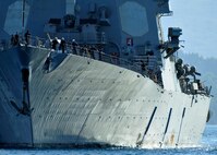 The guided missile destroyer USS Cole (DDG 67) arrives for a scheduled port visit in Souda Bay, Crete, Greece.