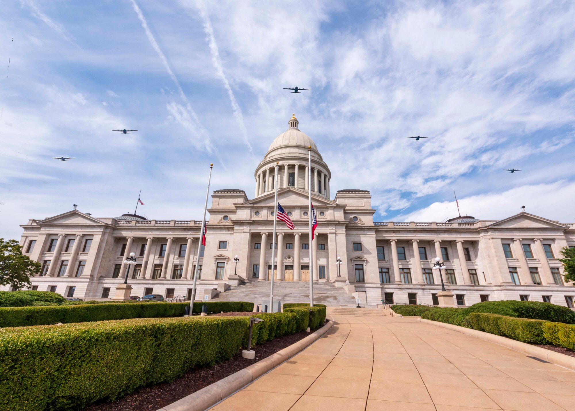 U.S. Air Force C-130s from Little Rock Air Force Base fly over Arkansas, Oct. 8, 2020, in celebration of the 65th anniversary of the base's first open house. The aerial review honored the local community for their unwavering support since 1955. (U.S. Air Force photo by Maj. Ashley Walker)