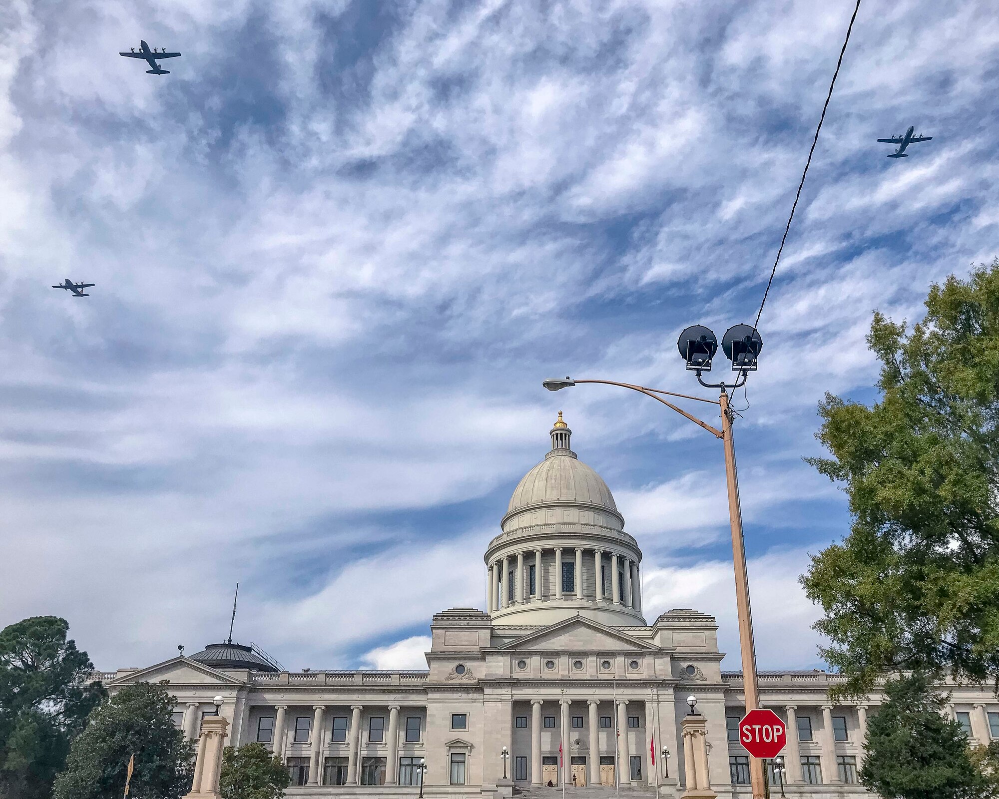 U.S. Air Force C-130s from Little Rock Air Force Base fly over Arkansas, Oct. 8, 2020, in celebration of the 65th anniversary of the base's first open house. The aerial review honored the local community for their unwavering support since 1955. (U.S. Air Force photo by Maj. Ashley Walker)