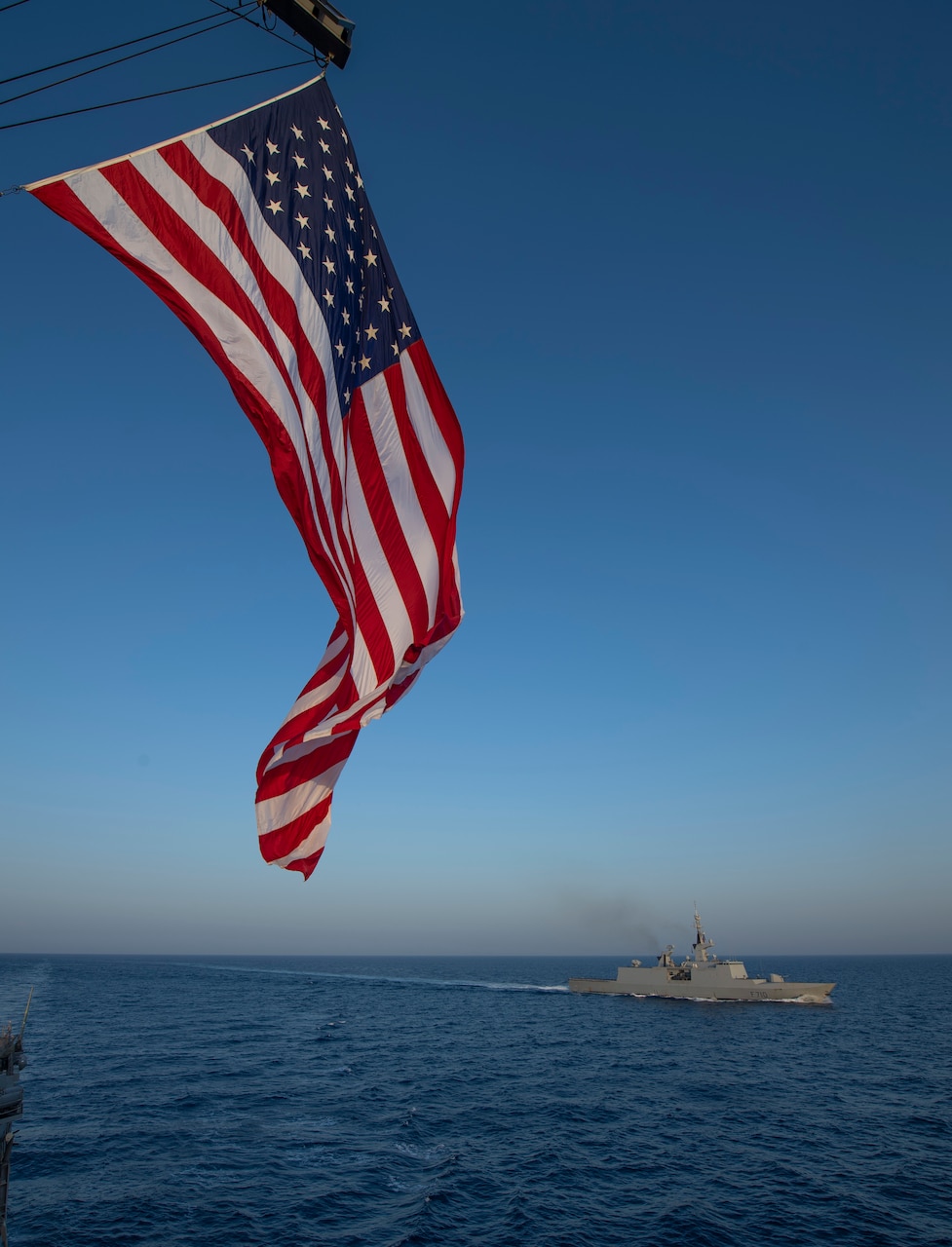 The French Navy executes a passing exercise with the Arleigh Burke-class guided-missile destroyer USS Roosevelt (DDG 80)