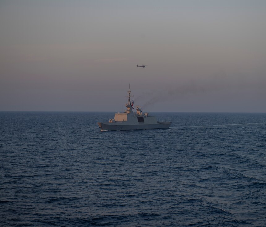 The French Navy executes a passing exercise with the Arleigh Burke-class guided-missile destroyer USS Roosevelt (DDG 80)