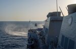 The French Navy executes a passing exercise with the Arleigh Burke-class guided-missile destroyer USS Roosevelt (DDG 80)
