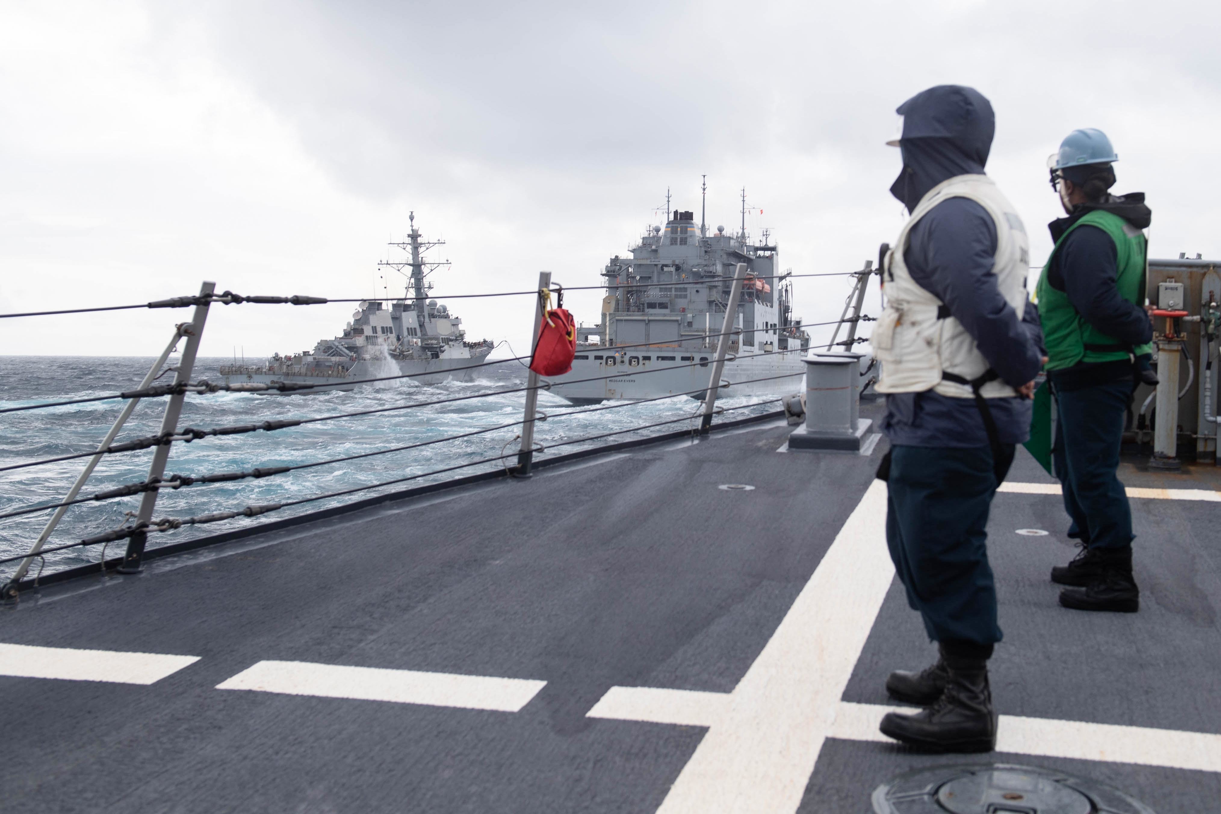 USS Ross (DDG 71) comes alongside USNS Medgar Evers (T-AKE 13) to receive fuel and supplies in tandem with USS Donald Cook (DDG 75).