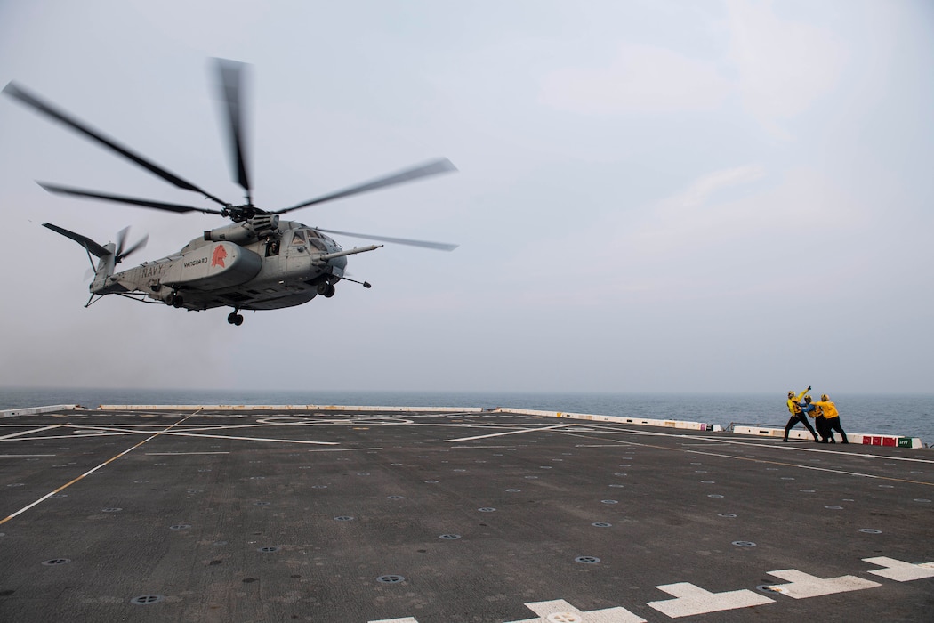 SEA OF JAPAN (Aug. 3, 2020)  An MH-53 Sea Dragon helicopter from Helicopter Mine Countermeasures Squadron 14 (HM-14) takes off from the flight deck of the amphibious transport dock ship USS New Orleans (LPD 18).