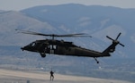 A UH-60 Black Hawk helicopter crew conducts hoist training to maintain proficiency in July 2020.