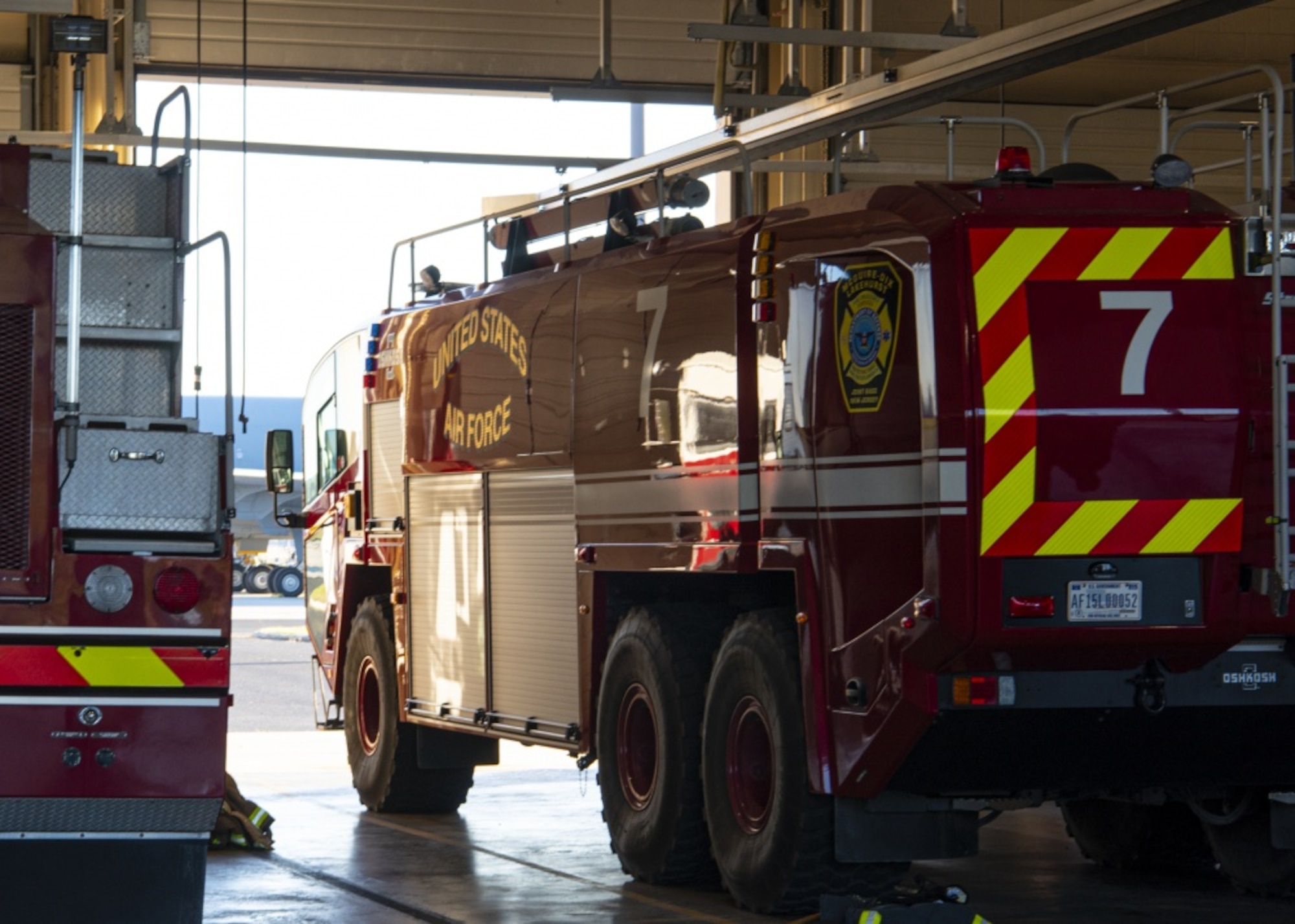 A photo of two fire trucks.