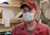 Petty Officer 1st Class Michael Catron, a native of Harrisonville, Missouri, is serving aboard the USS Cole.