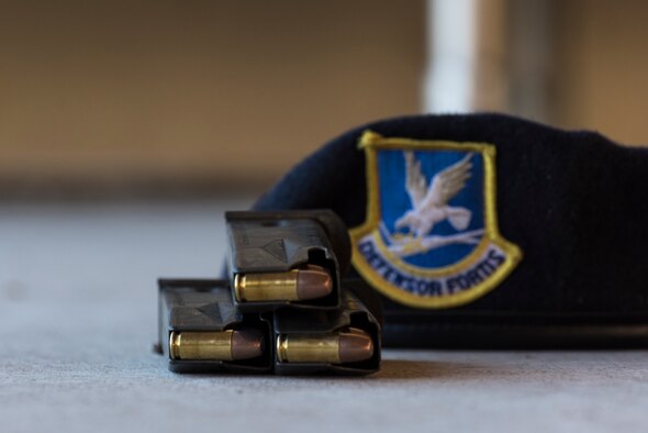 Senior Airman Lindsay Francher, 47th Security Forces Squadron Combat Arms instructor, calculates how much ammunition will be needed for the shooting portion of the day’s training, Oct. 1, 2020 at Laughlin Air Force Base, Texas. She teaches weapons knowledge in the classroom as well as the range. (U.S. Air Force photo by Senior Airman Anne McCready)