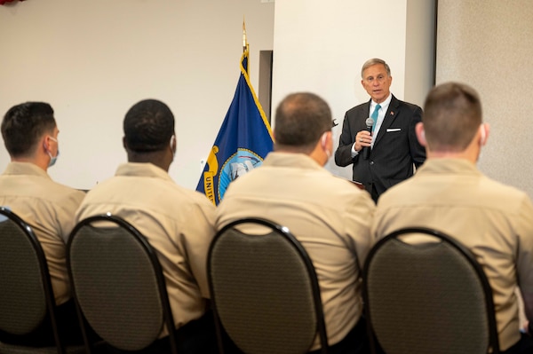 Acting Under Secretary of the Navy Gregory J. Slavonic speaks to awardees during an award ceremony at Naval Air Station Corpus Christi.