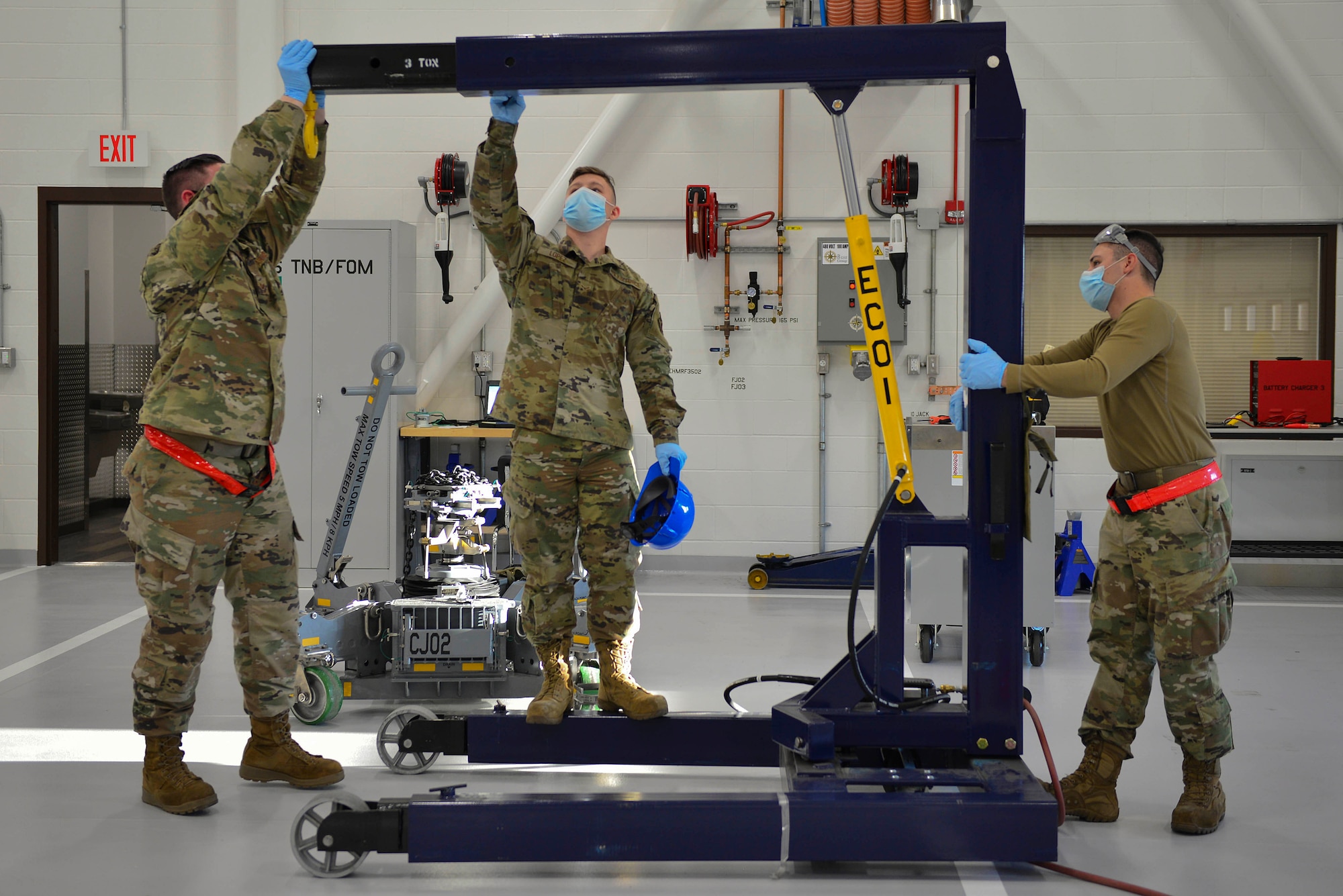 U.S. Air Force Airmen assigned to the the 354th Maintenance Squadron (MXS) prepare a crane at Eielson Air Force Base, Alaska, Oct. 7, 2020.