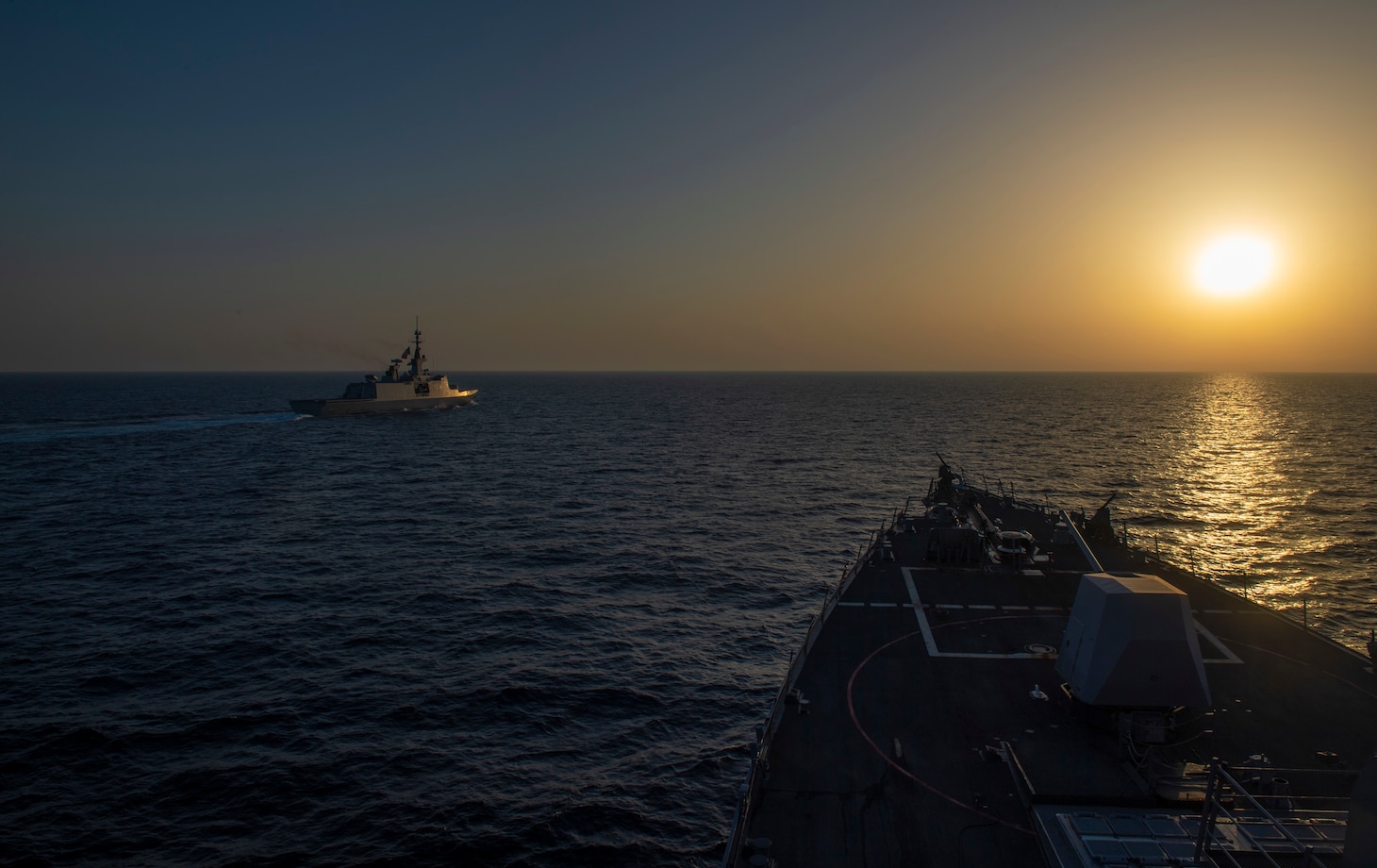 The French Navy executes a passing exercise with the Arleigh Burke-class guided-missile destroyer USS Roosevelt (DDG 80)