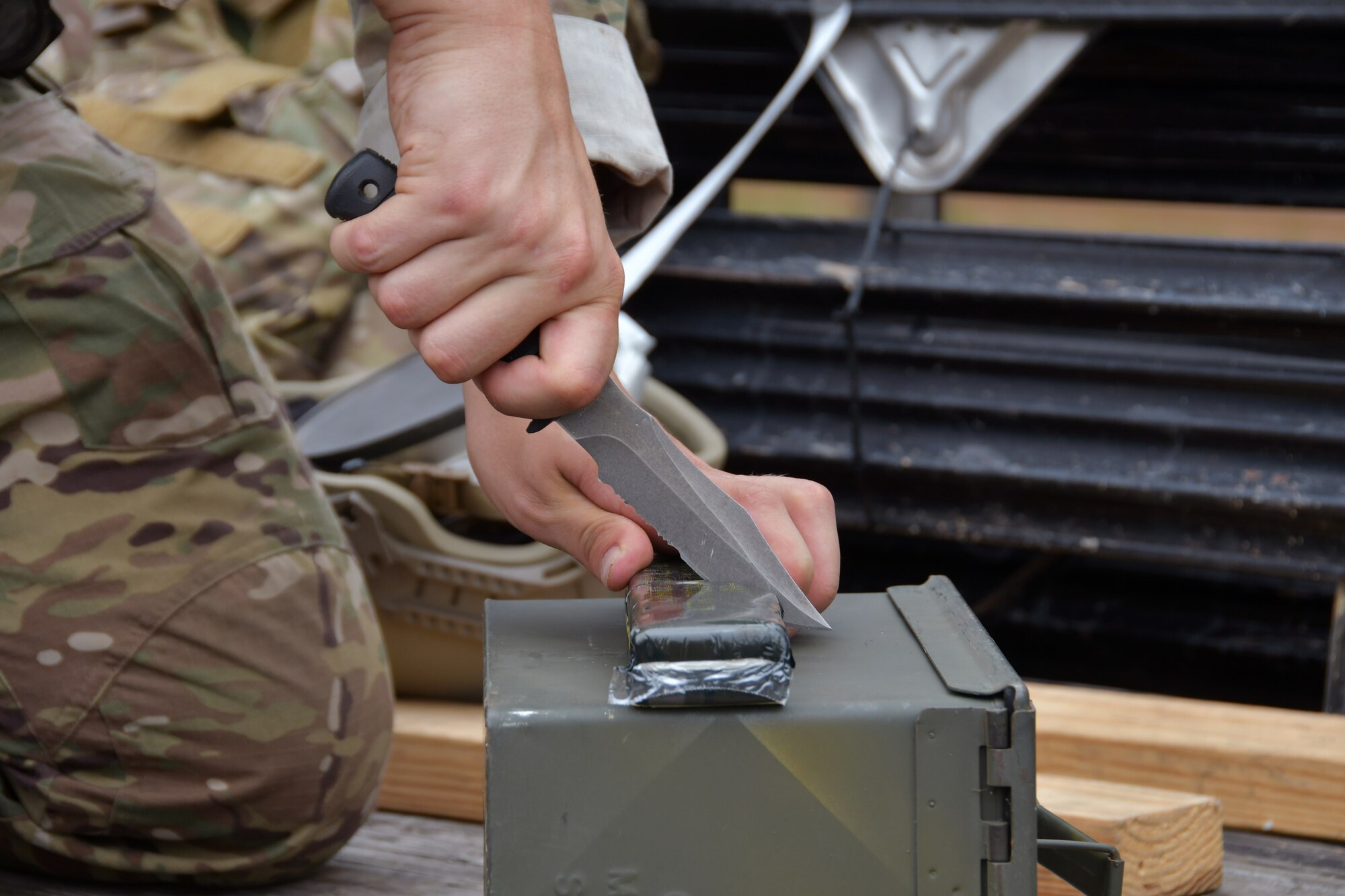 A 94th EOD Flight technician prepares a block of C-4 at Fort Stewart, Georgia, Sept. 16, 2020. Throughout the exercise, members went through numerous tasks such as working with electric demolition procedures, non-electric demolition procedures, demolition shape charges and cratering charges. (U.S. Air Force photo by Airman 1st Class Kendra A. Ransum)