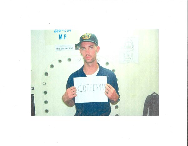 A scanned historical photo of Fire Controlman 1st Class Craig Cotherman, when his photo taken following the bombing of the USS Cole (DDG 67) on Oct. 12, 2000.
