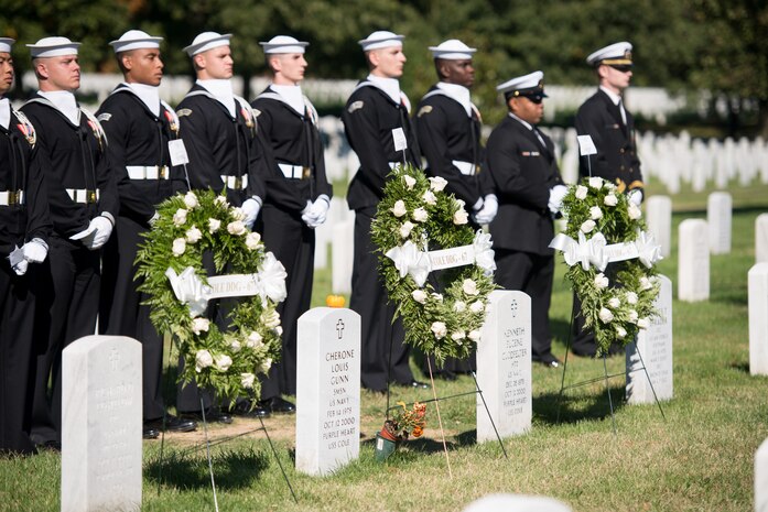 Sailors from the United States Navy Ceremonial Guard take part in a ceremony in Arlington National Cemetery, Arlington, Va., Oct. 12, 2015, to remember the 17 American Sailors killed during the terrorist attack against the USS Cole.