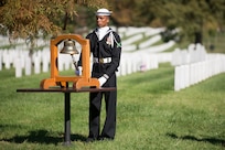 A Sailor from the United States Navy Ceremonial Guard takes part in a ceremony in Arlington National Cemetery, Arlington, Va., Oct. 12, 2015, to remember the 17 American Sailors killed during the terrorist attack against the USS Cole.