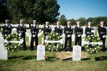 Sailors from the United States Navy Ceremonial Guard take part in a ceremony in Arlington National Cemetery, Arlington, Va., Oct. 12, 2015, to remember the 17 American Sailors killed during the terrorist attack against the USS Cole.