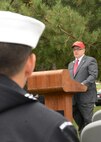 Retired Command Master Chief (CMC) James Parlier speaks during the USS Cole (DDG 67) commemoration at the Cole Memorial on Naval Station Norfolk. Parlier was the CMC aboard Cole (DDG 67) during the attack.