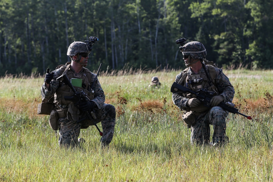 Marines post security during an airfield assault and seizure simulation at Marine Corps Outlying Landing Field, Camp Davis, NC, June 9, 2020. The simulation was a part of a Marine Corps Air-Ground Task Force exercise with the 24th Marine Expeditionary Unit. The exercise is designed to increase the MEU’s proficiency and enhance their capabilities as a MAGTF. The Marines are with 1st Battalion, 8th Marine Regiment. (U.S. Marine Corps photo by Cpl. Margaret Gale)