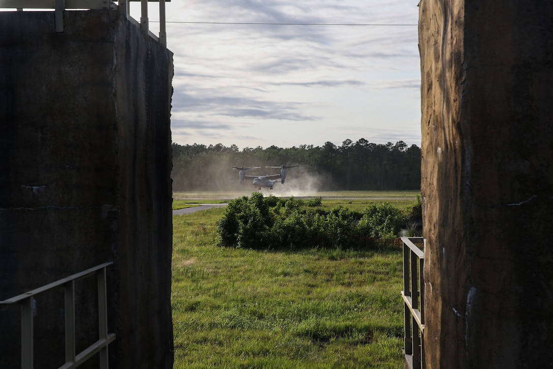 An MV-22B Osprey executes an approach during an airfield assault and seizure simulation at Marine Corps Outlying Landing Field, Camp Davis, NC, June 9, 2020. The simulation was a part of a Marine Corps Air-Ground Task Force exercise with the 24th Marine Expeditionary Unit. The exercise is designed to increase the MEU’s proficiency and enhance their capabilities as a MAGTF. The aircraft is with Marine Medium Tilt-Rotor Squadron 162. (U.S. Marine Corps photo by Cpl. Margaret Gale)