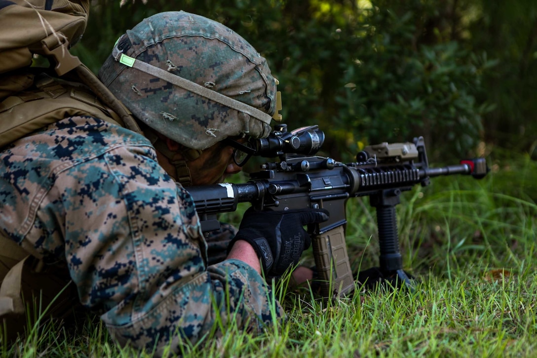 U.S. Marine Corps Pfc. Steven Sullivan, a mortarman with 1st Battalion 8th Marines, provides security during a raid training exercise at Camp Lejeune, N.C., Sept. 22, 2020. The purpose of the exercise was to promote familiarization with ship to shore procedures and raid tactics for pre-deployment readiness with the 24th Marine Expeditionary Unit. (U.S. Marine Corps photo by Lance Cpl. Davis Harris)
