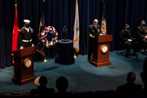 Vice Adm. James Kilby, deputy chief of naval operations, warfighting requirements and capabilities, delivers remarks during a wreath-laying ceremony at the Navy Memorial Burke Theater commemorating the 20th anniversary of the attack on the U.S. Navy guided-missile destroyer USS Cole (DDG 67), Oct. 12.
