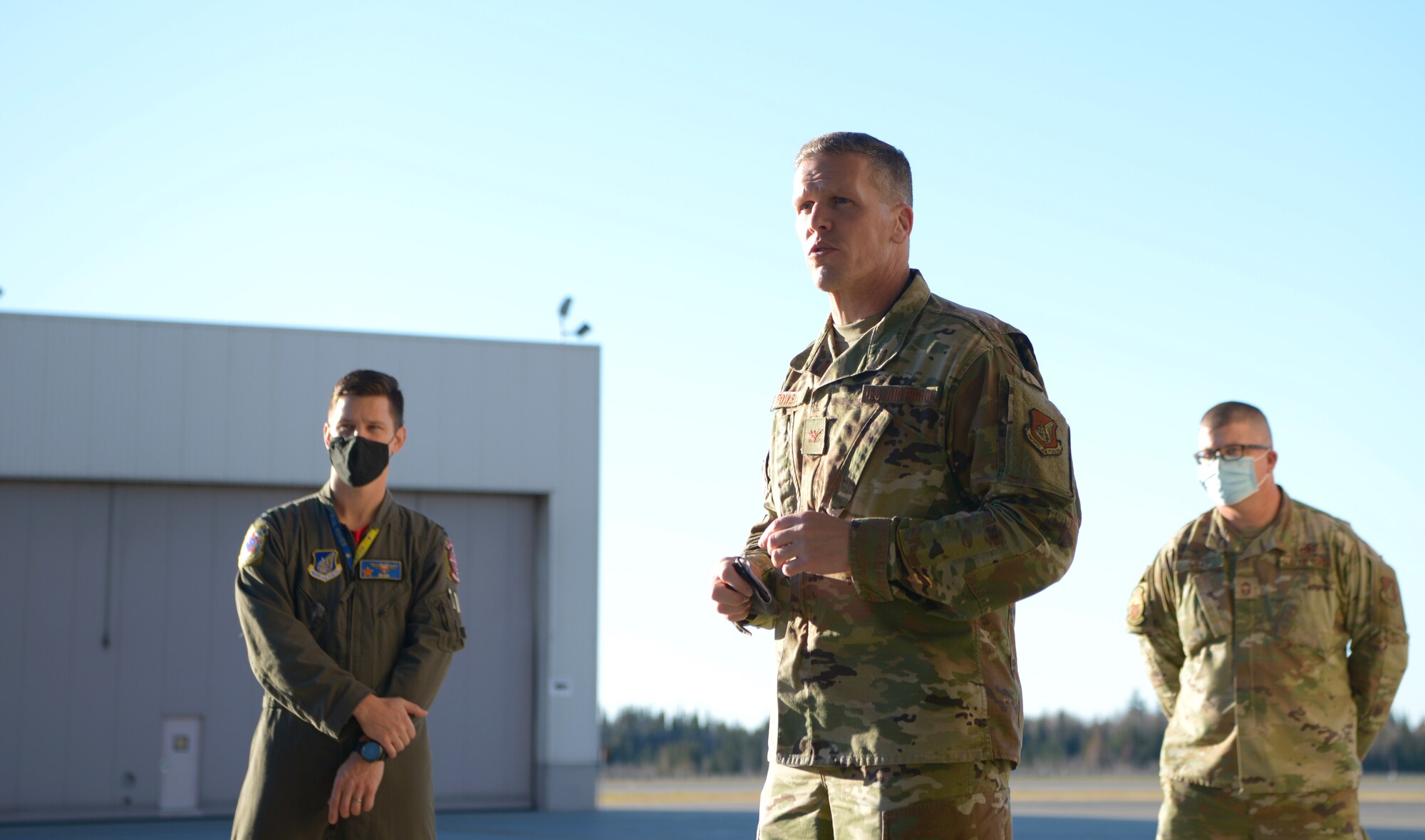 U.S. Air Force Col. Matthew Powell, the 354th Maintenance Group commander, speaks at a Dedicated Crew Chief (DCC) ceremony on Eielson Air Force Base, Alaska, Oct. 9, 2020. The ceremony recognized 29 maintenance Airmen for their commitment to their work and awarded the title of DCC. (U.S. Air Force photo by Senior Airman Beaux Hebert)