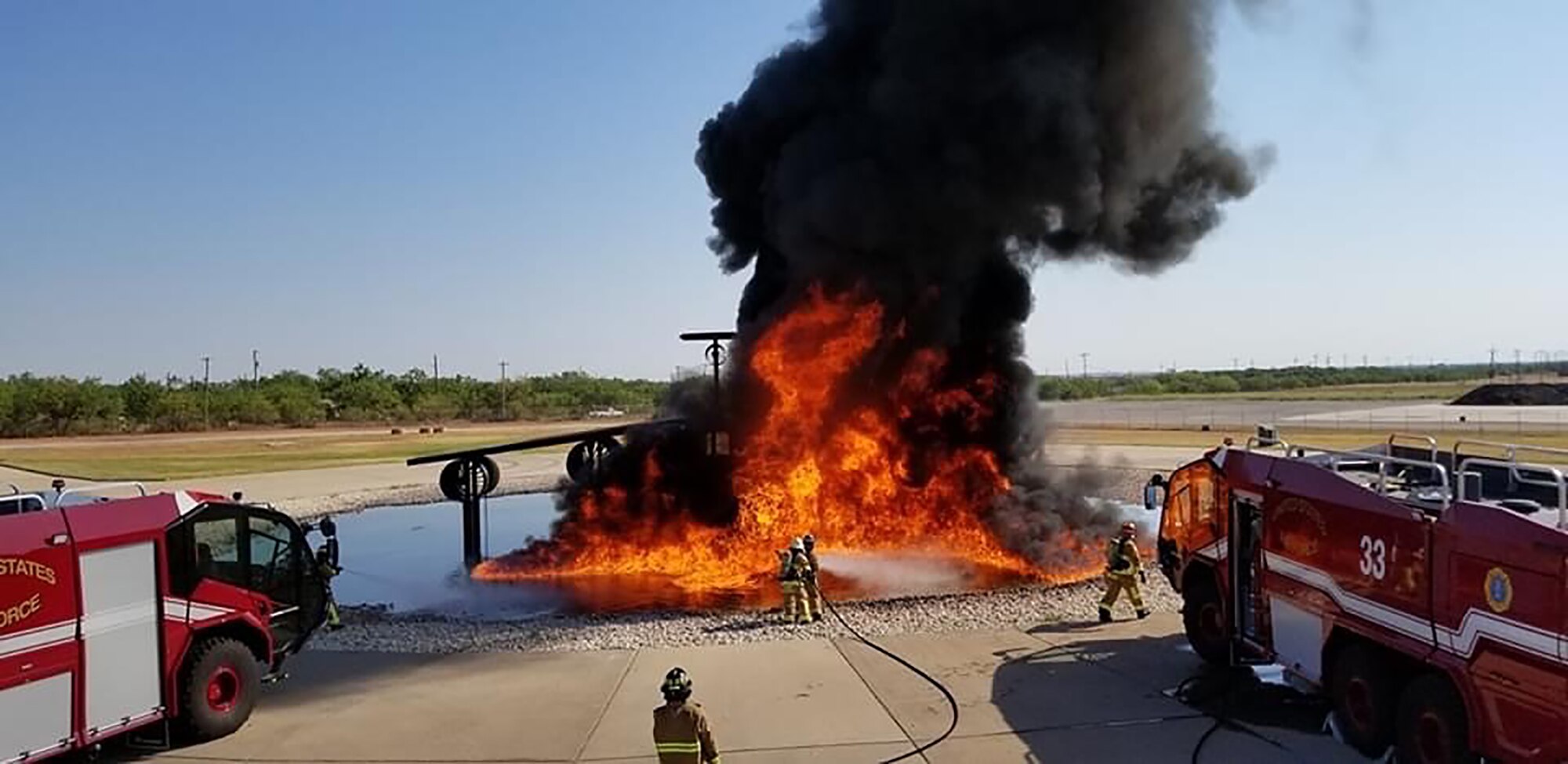Firefighters from the 445th Civil Engineer Squadron train using Ultra High Pressure (UHP) Aircraft Rescue Firefighting (ARFF) vehicles at Dyess Air Force Base, Texas.