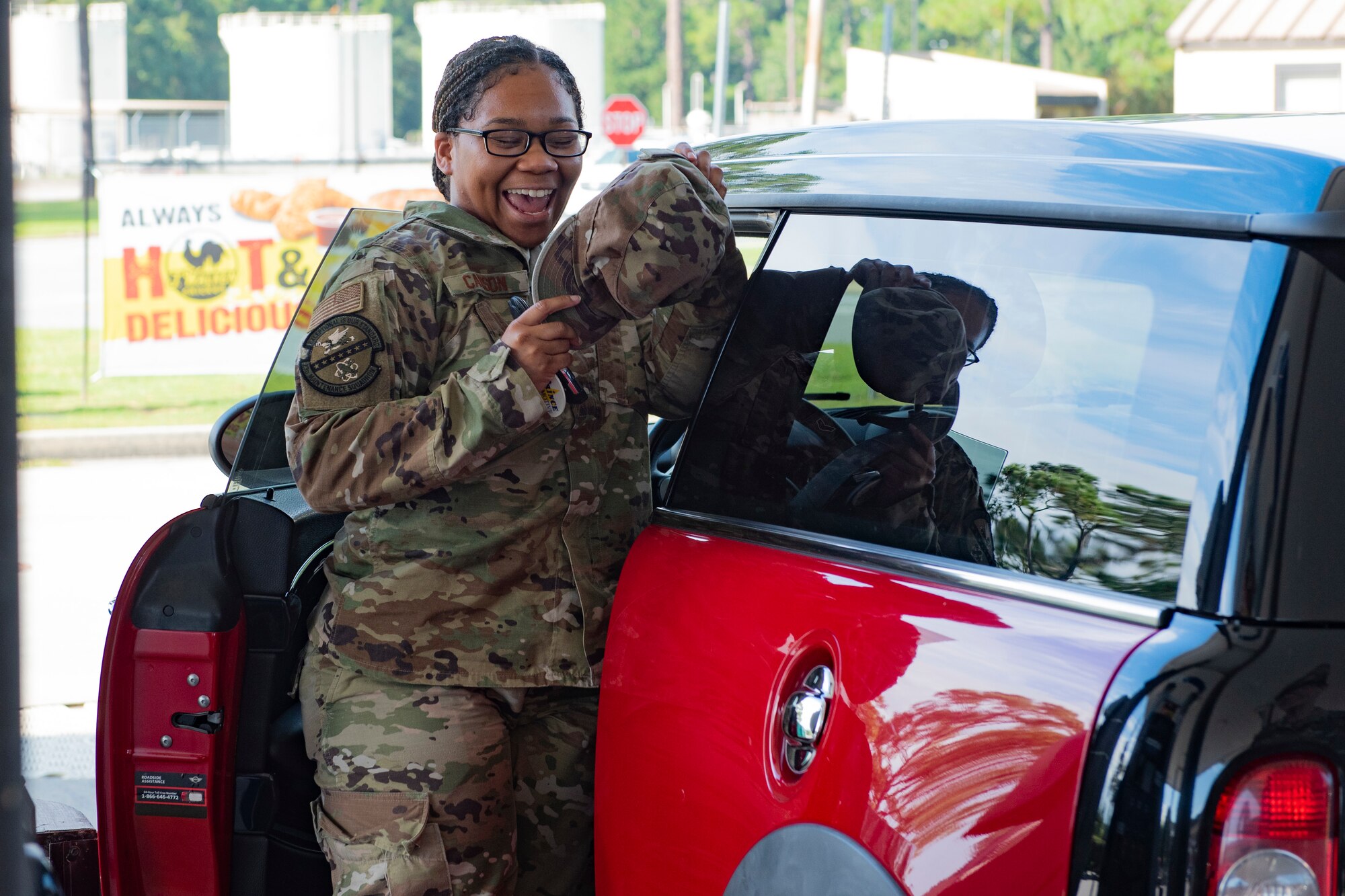 A photo of an Airman smiling.