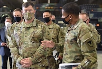 Col. Wheeler R. Manning, commander, 403rd Army Field Support Brigade, briefs Lt. Gen. Willard M. Burleson III, commanding general, Eighth Army, on the brigade’s diverse mission set at Camp Carroll, South Korea, Oct. 6.