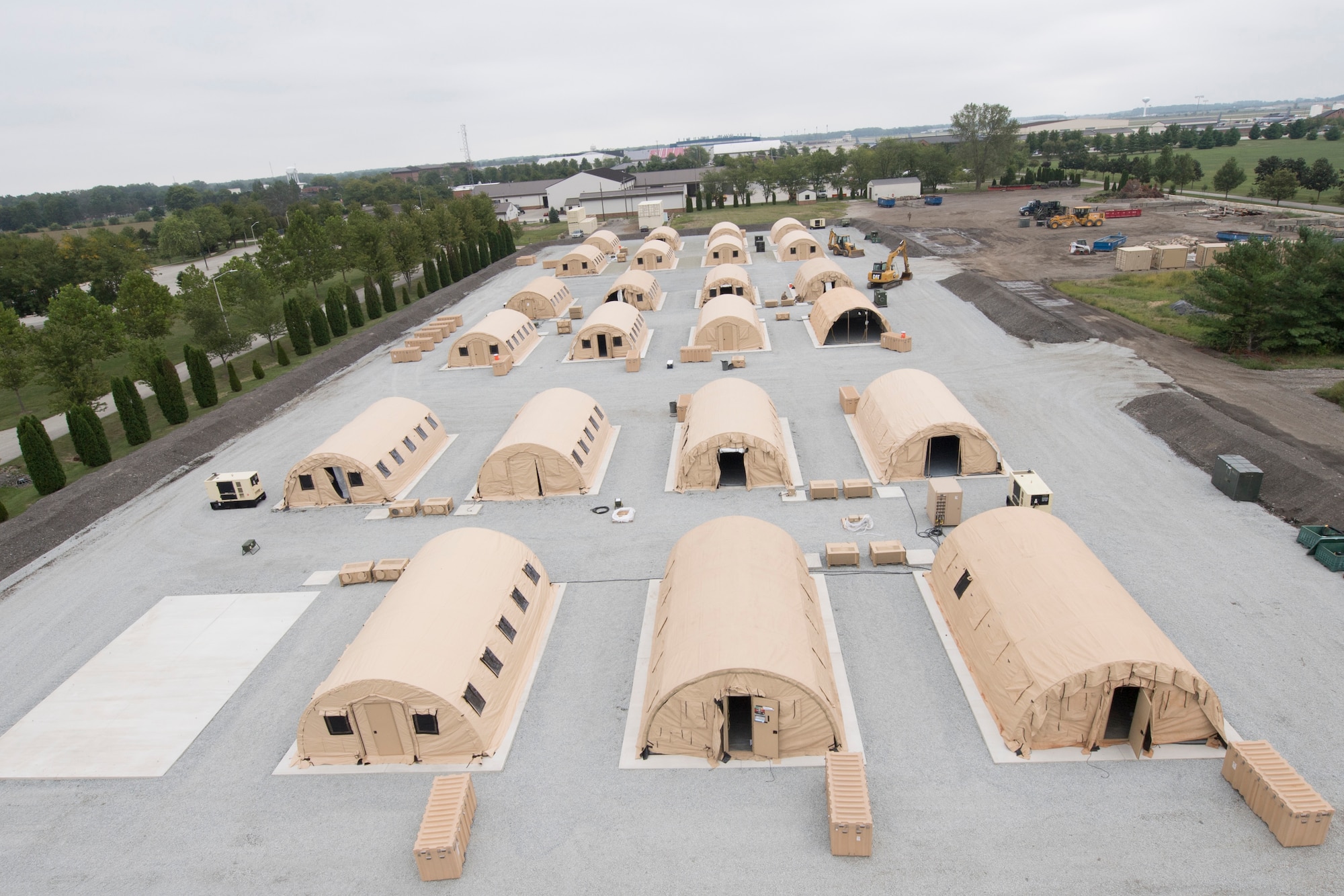 Airmen from the 434th Civil Engineer Squadron recently set up a bare base with 24 tents, in roughly 10 hours. The new site consists of multiple concrete pads, much like the ones found in a deployed environment, allowing engineers to participate in a realistic deployed scenario. (U.S. Air Force photo/Master Sgt. Ben Mota)